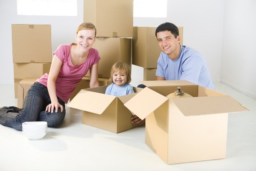 Packed boxes and furniture showing a load-based removal estimate in Stockwell