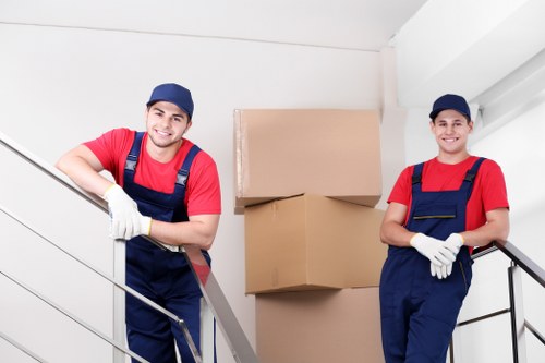 Removal team preparing equipment and safety checks before a move