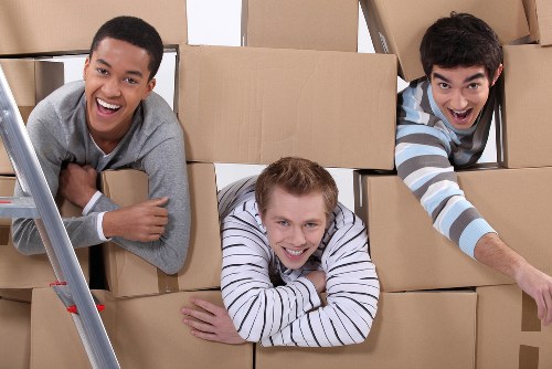 Packing office equipment and files for relocation in Stockwell