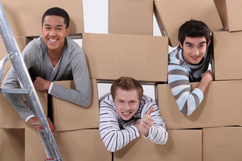 Local removalists loading household items for transport