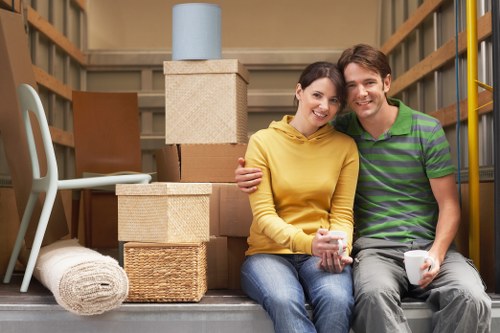 Loading furniture and boxes into a moving truck for a Stockwell relocation