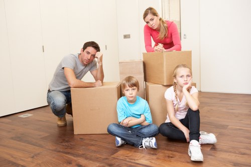 Packed household boxes and furniture ready for transport